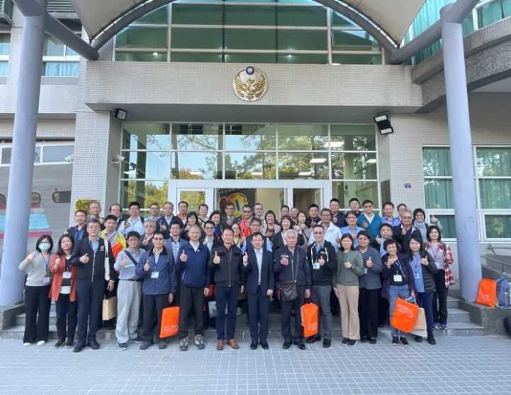 Participants take a group photo during the visit to the Hsinchu City Fire Training Base.